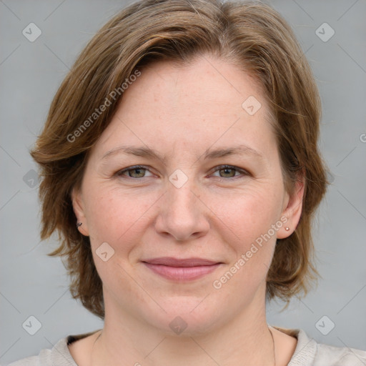 Joyful white young-adult female with medium  brown hair and blue eyes