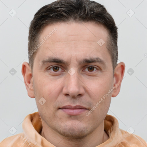 Joyful white adult male with short  brown hair and brown eyes