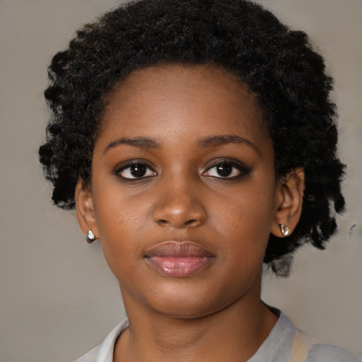 Neutral black young-adult female with short  black hair and brown eyes