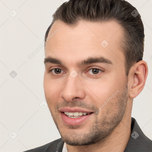 Joyful white young-adult male with short  brown hair and brown eyes