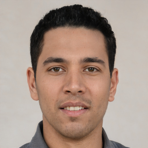 Neutral white young-adult male with short  black hair and brown eyes