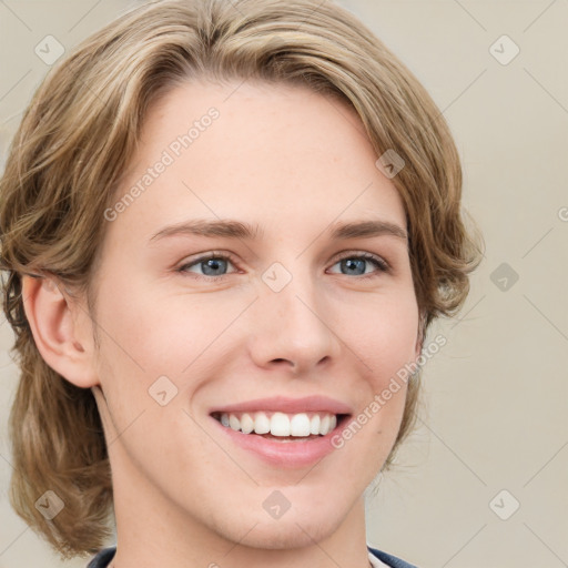 Joyful white young-adult female with medium  brown hair and blue eyes