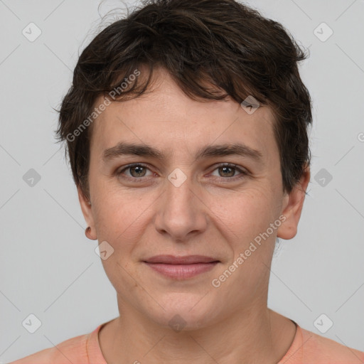 Joyful white young-adult female with short  brown hair and brown eyes