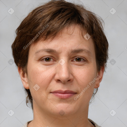 Joyful white adult female with short  brown hair and brown eyes