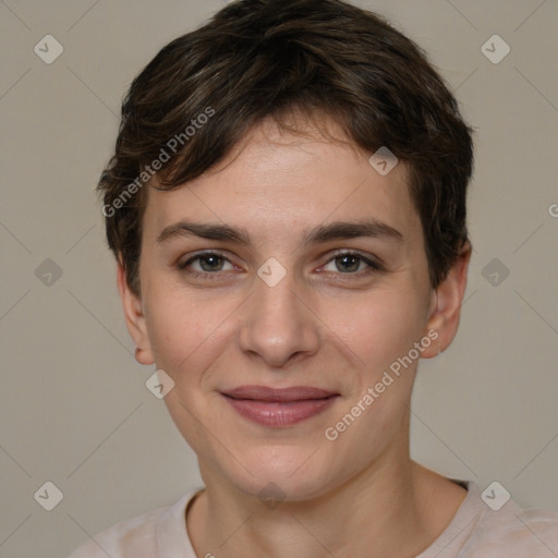 Joyful white young-adult female with short  brown hair and brown eyes