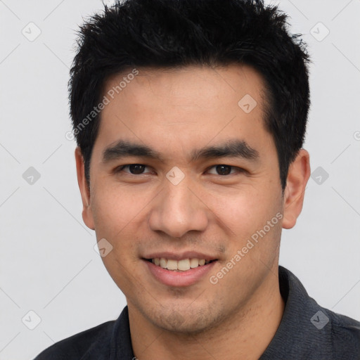 Joyful white young-adult male with short  black hair and brown eyes