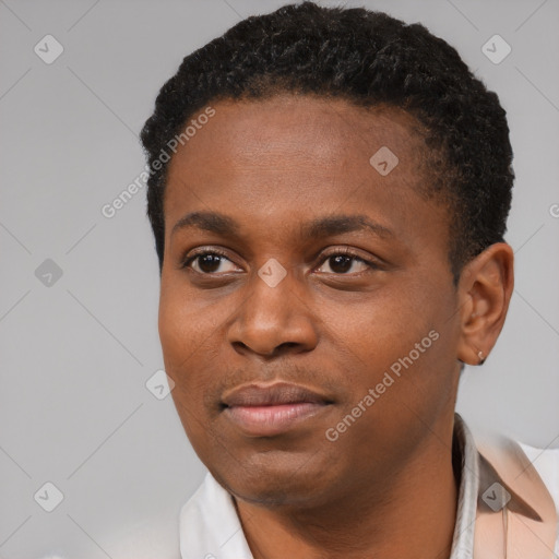 Neutral black young-adult male with short  black hair and brown eyes
