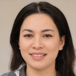 Joyful asian young-adult female with medium  brown hair and brown eyes