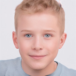 Joyful white child male with short  brown hair and blue eyes