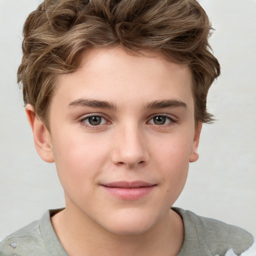 Joyful white child male with short  brown hair and brown eyes