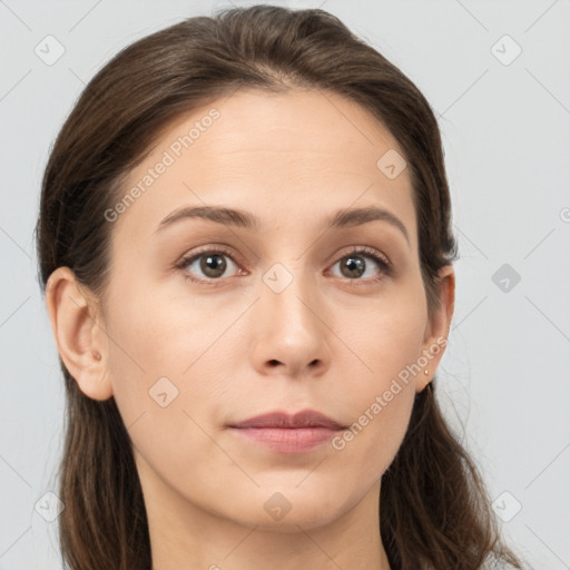 Neutral white young-adult female with long  brown hair and brown eyes