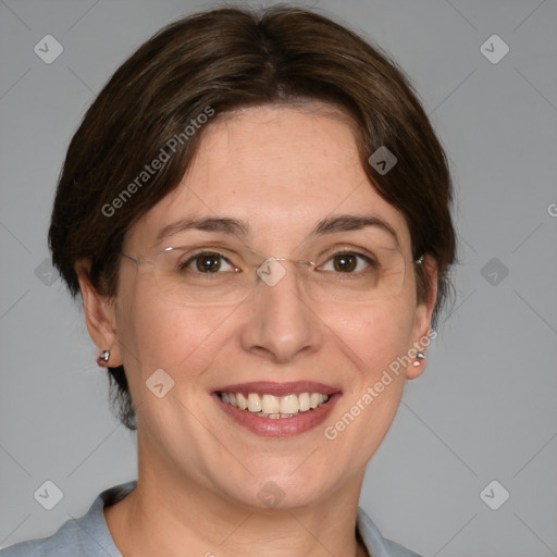 Joyful white adult female with medium  brown hair and blue eyes