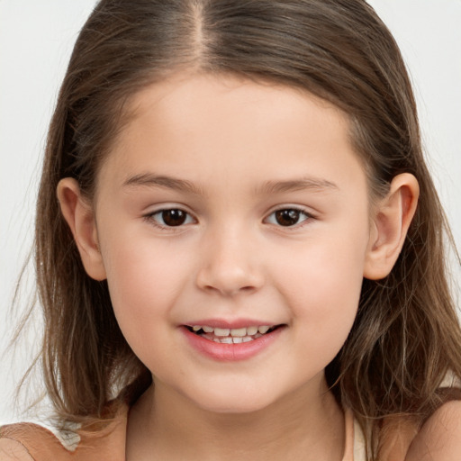 Joyful white child female with medium  brown hair and brown eyes