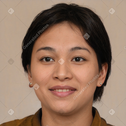 Joyful latino young-adult female with medium  brown hair and brown eyes