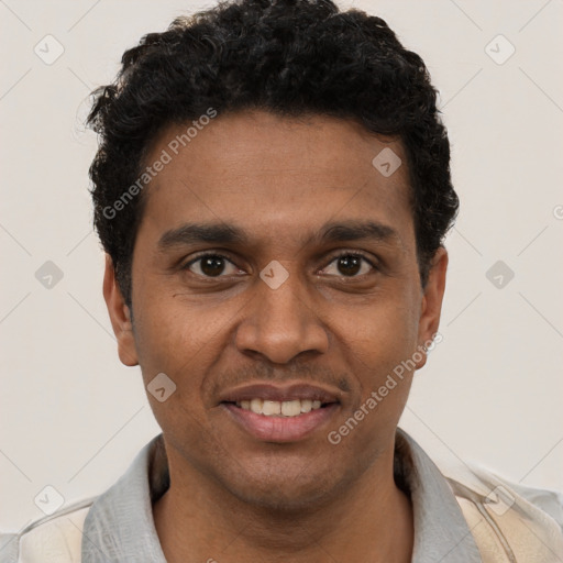 Joyful black young-adult male with short  black hair and brown eyes