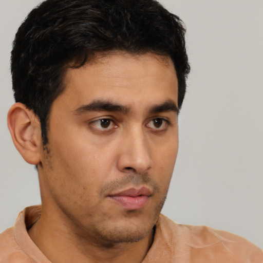 Neutral latino young-adult male with short  black hair and brown eyes