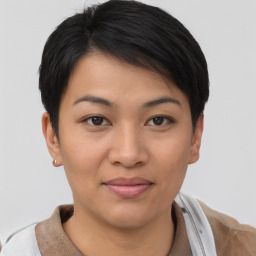 Joyful asian young-adult female with short  brown hair and brown eyes