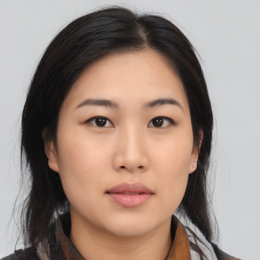 Neutral asian young-adult female with medium  black hair and brown eyes