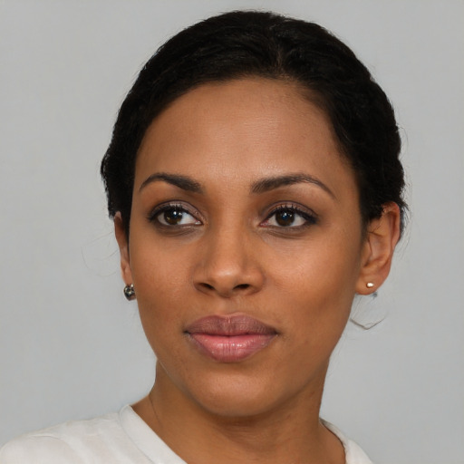 Neutral black young-adult female with short  black hair and brown eyes
