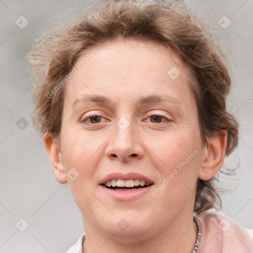 Joyful white adult female with medium  brown hair and grey eyes