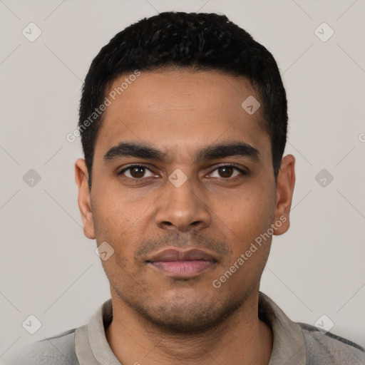 Neutral latino young-adult male with short  black hair and brown eyes