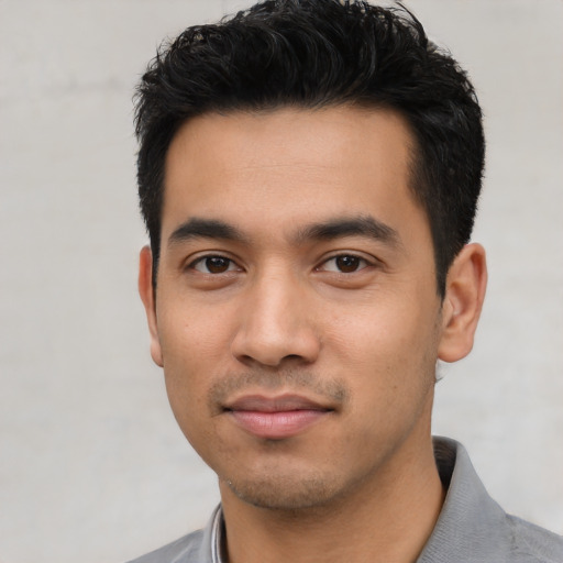 Neutral asian young-adult male with short  black hair and brown eyes