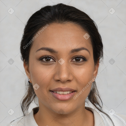 Joyful latino young-adult female with medium  brown hair and brown eyes