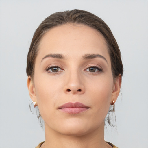 Neutral white young-adult female with medium  brown hair and brown eyes