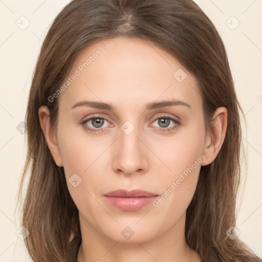 Neutral white young-adult female with long  brown hair and brown eyes