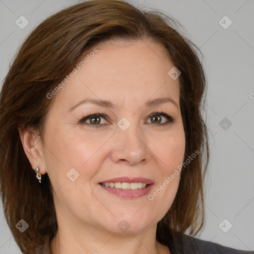 Joyful white adult female with medium  brown hair and brown eyes