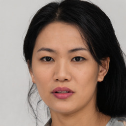 Neutral asian young-adult female with medium  black hair and brown eyes