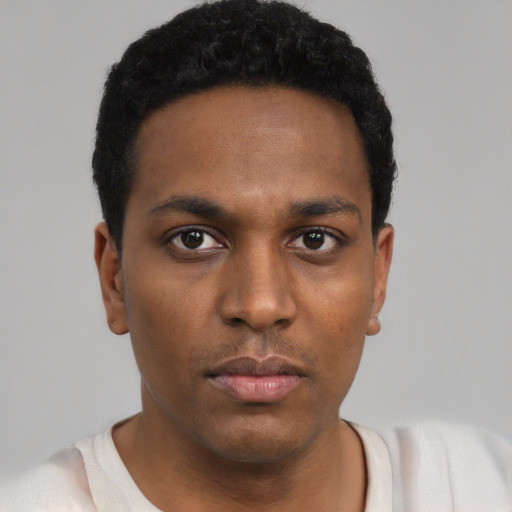 Neutral black young-adult male with short  black hair and brown eyes