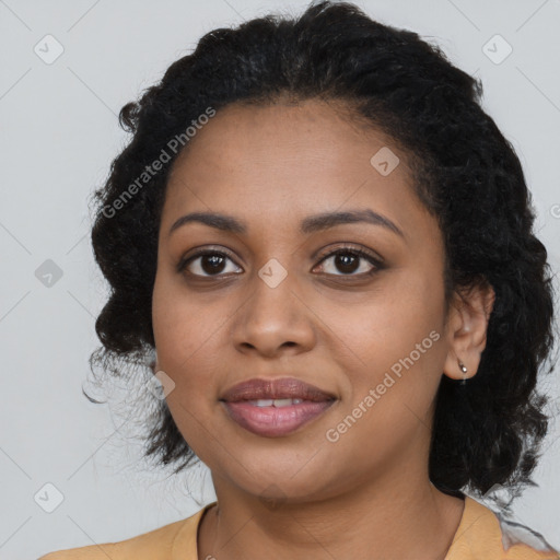 Joyful black young-adult female with long  brown hair and brown eyes