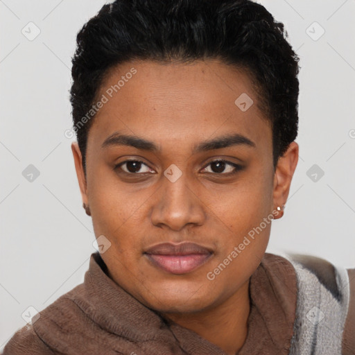 Joyful black young-adult female with short  brown hair and brown eyes