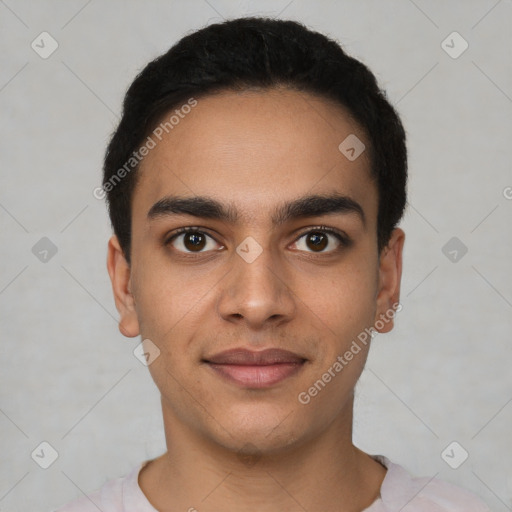 Joyful latino young-adult male with short  black hair and brown eyes