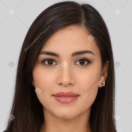 Joyful latino young-adult female with long  brown hair and brown eyes