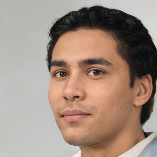 Neutral white young-adult male with short  black hair and brown eyes