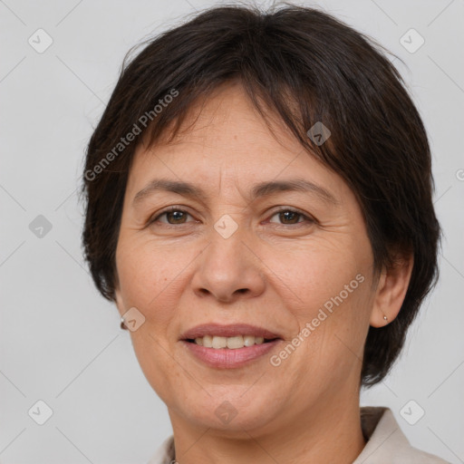 Joyful white adult female with medium  brown hair and brown eyes