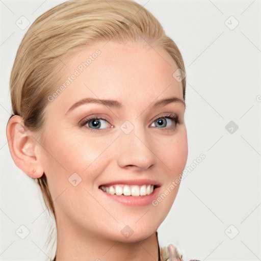 Joyful white young-adult female with medium  brown hair and blue eyes