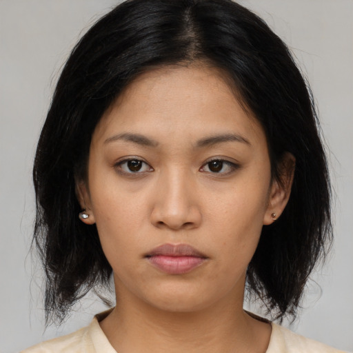 Neutral asian young-adult female with medium  black hair and brown eyes