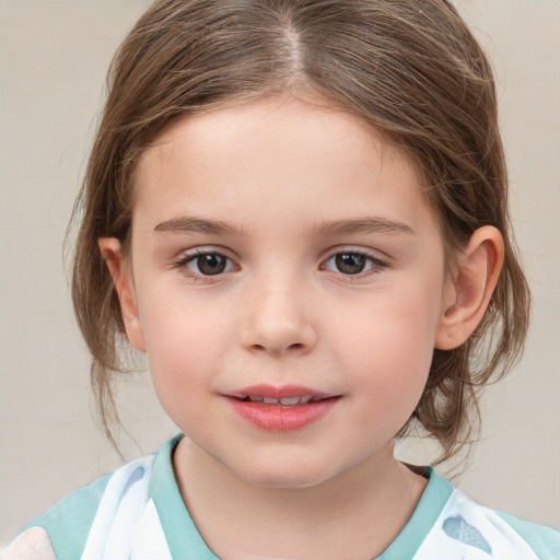 Joyful white child female with medium  brown hair and grey eyes