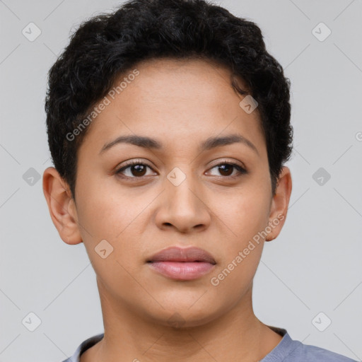 Joyful latino young-adult female with short  brown hair and brown eyes