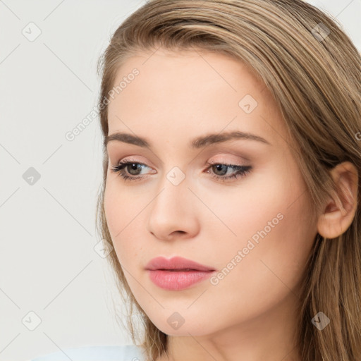 Neutral white young-adult female with long  brown hair and brown eyes