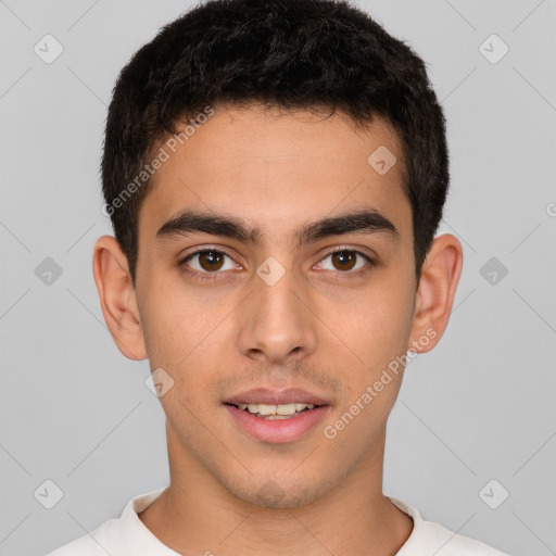 Joyful white young-adult male with short  brown hair and brown eyes