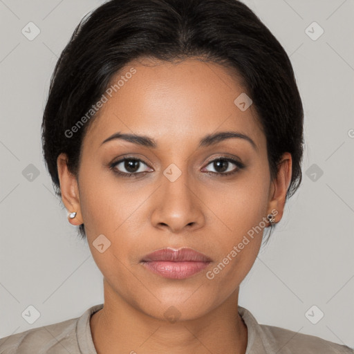 Joyful latino young-adult female with medium  black hair and brown eyes