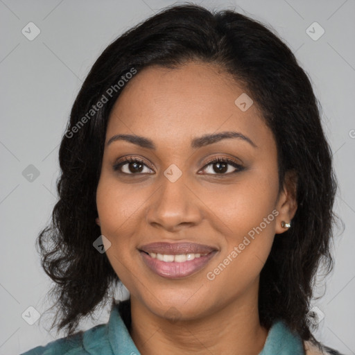 Joyful black young-adult female with medium  brown hair and brown eyes