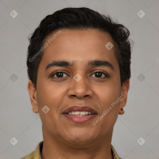 Joyful latino young-adult male with short  brown hair and brown eyes