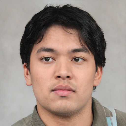 Neutral asian young-adult male with short  brown hair and brown eyes