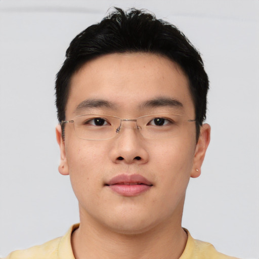 Neutral asian young-adult male with short  brown hair and brown eyes