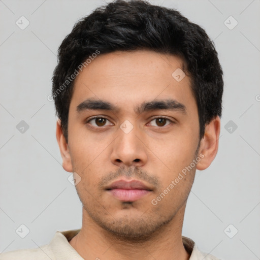 Neutral latino young-adult male with short  black hair and brown eyes